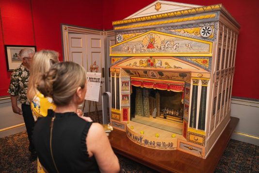 Guests viewing historic model exhibit