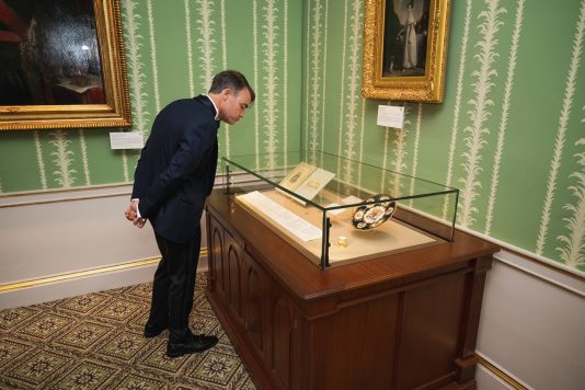 Guest viewing museum exhibit