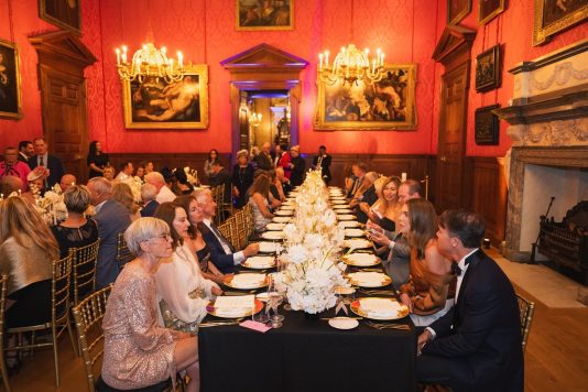 Guests enjoying formal dinner at Kensington Palace