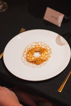 Plated dessert with decorative garnish