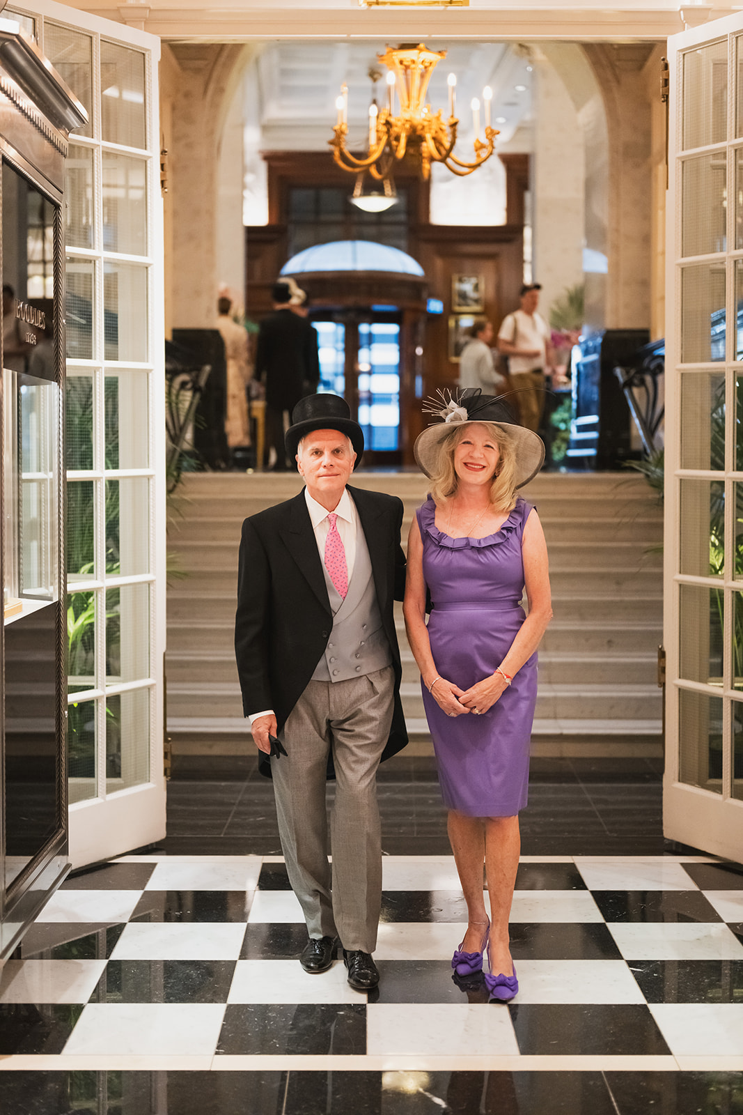 Guests posed at staircase entrance
