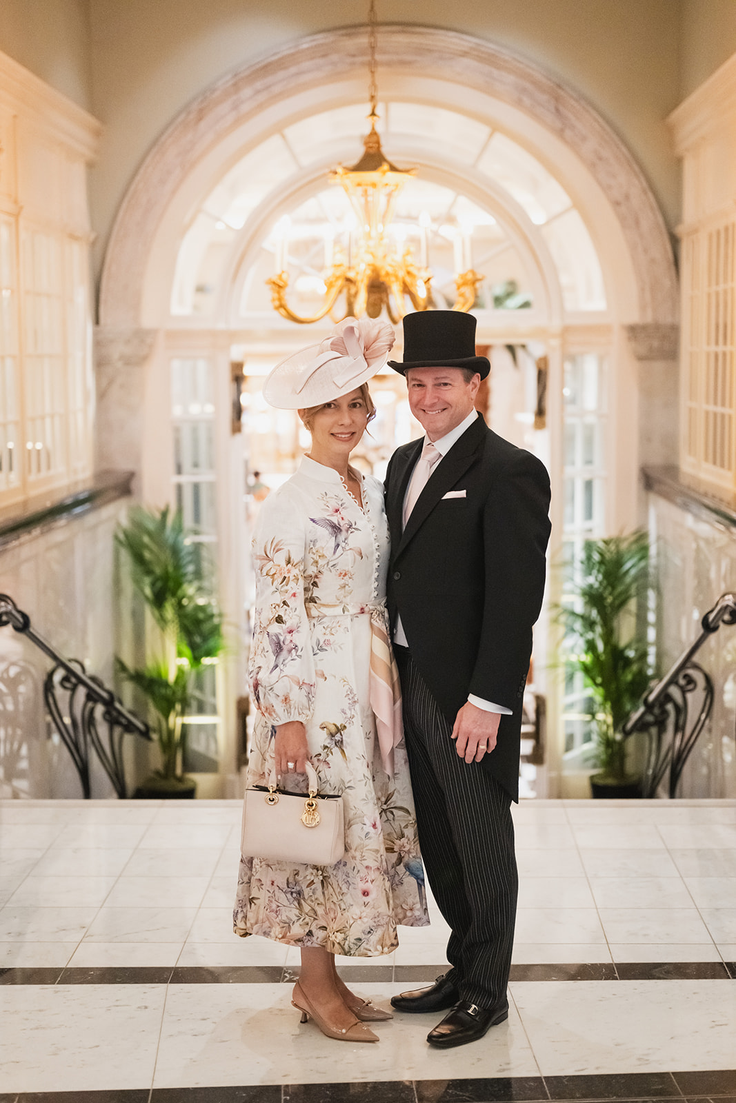 Matching hats in hotel corridor