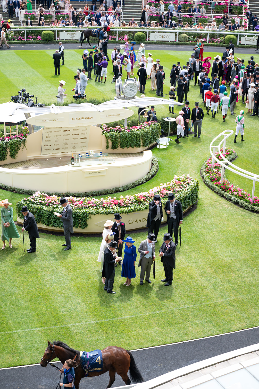 Winner's enclosure beside flower beds