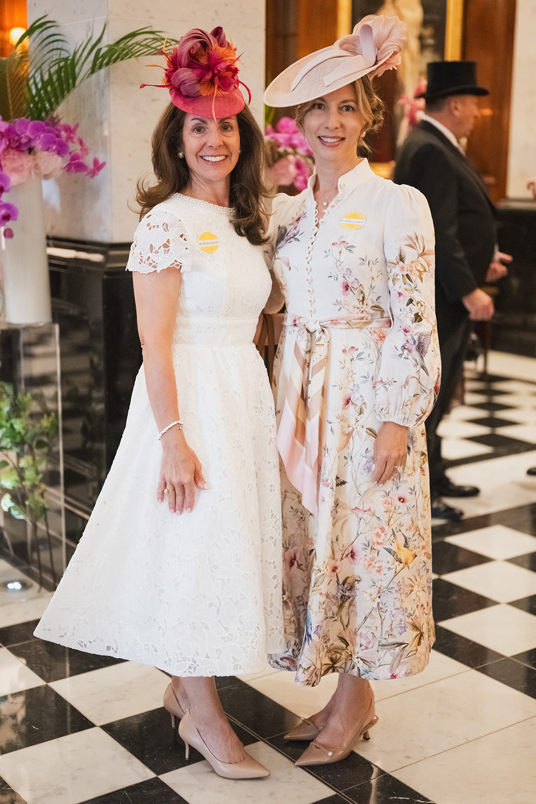 Guests posing in floral attire