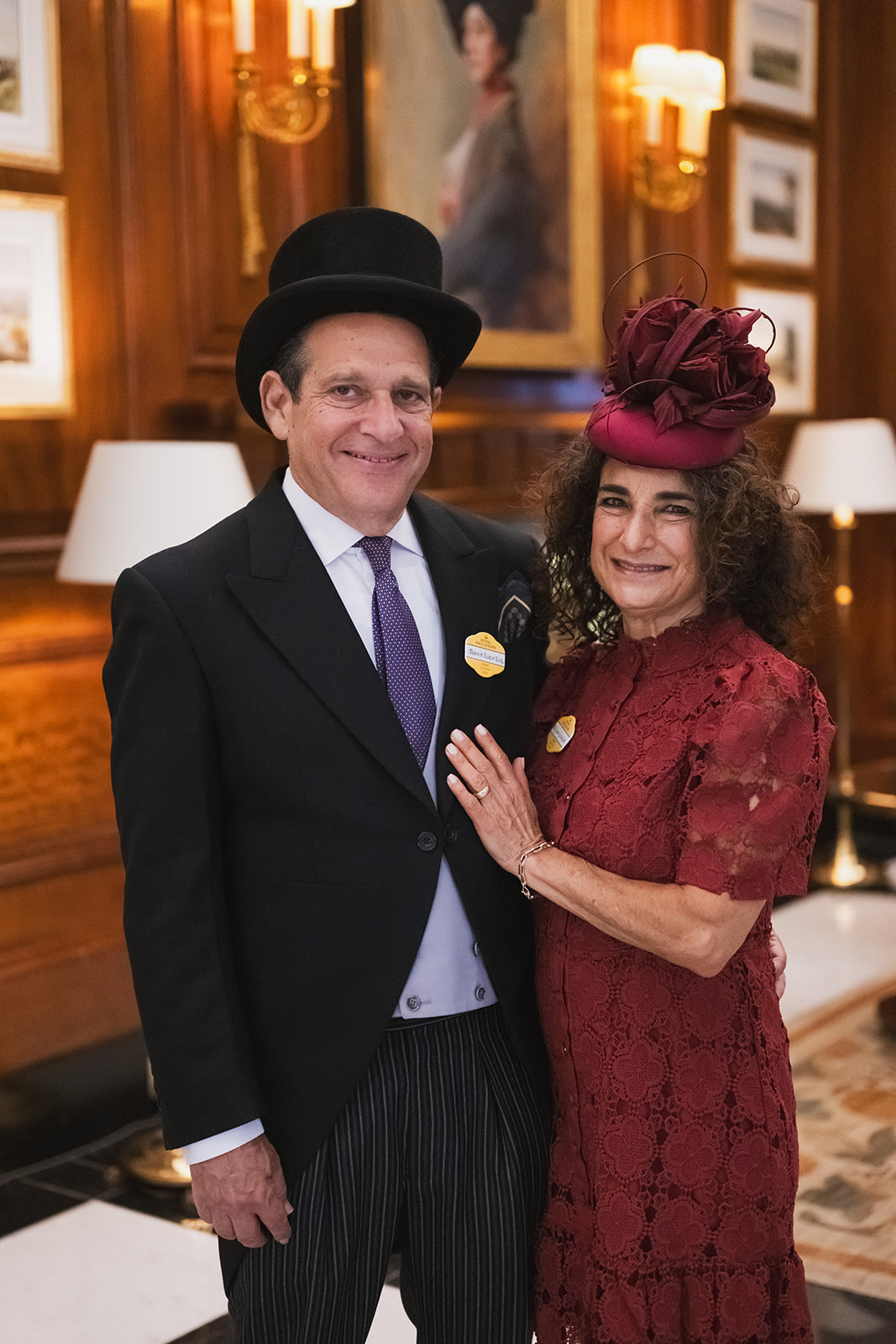 Two attendees posing at event