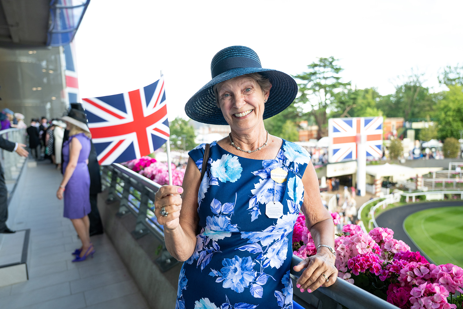 Attendee holding Union Jack flag