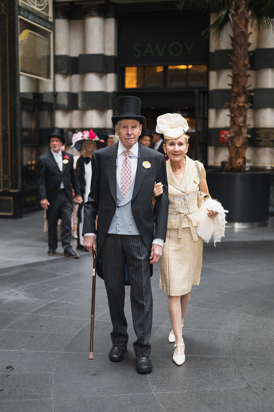 Walking with cane through hotel lobby