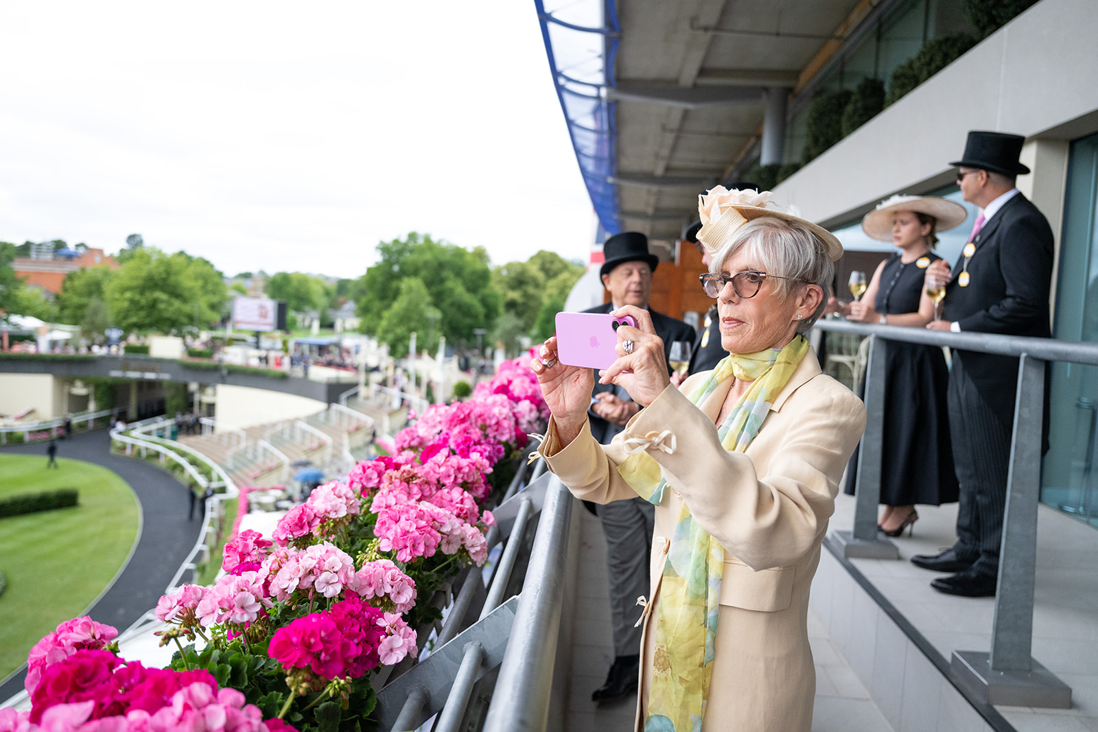 Taking photo from balcony overlooking track