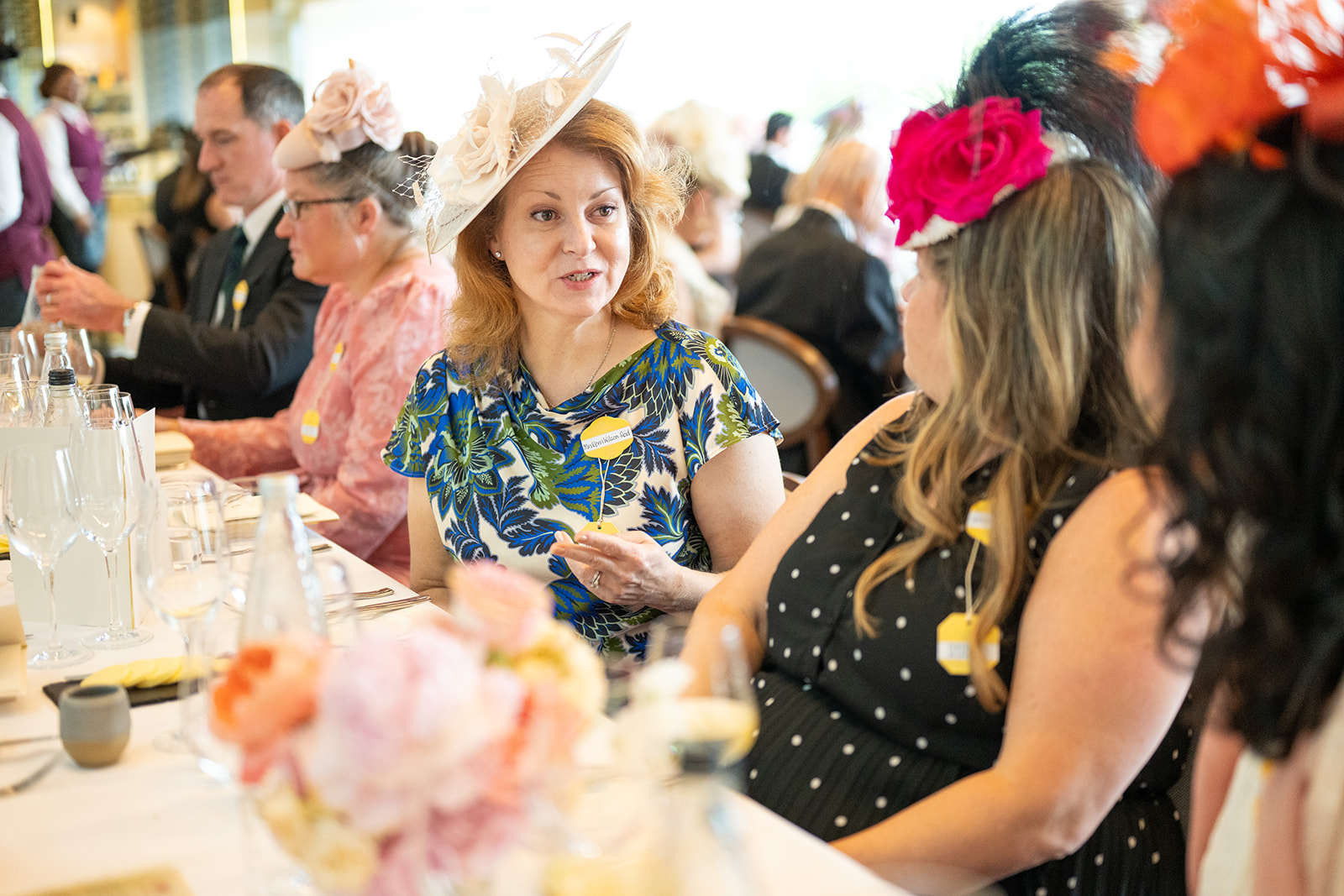 Floral print dress during table conversation