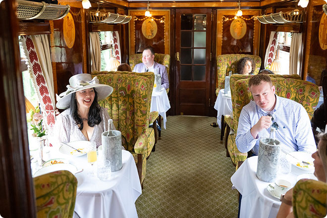 Guests dining aboard British Pullman train