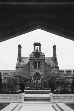 Manor building facade in black and white.