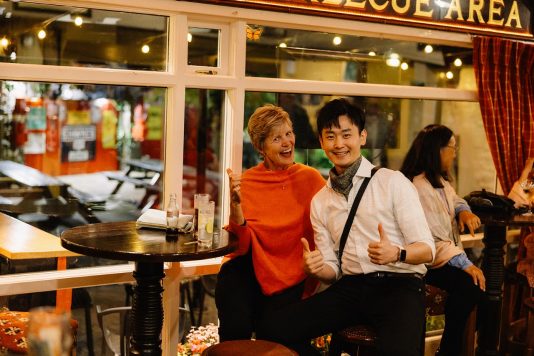 Busy restaurant interior with guests dining.