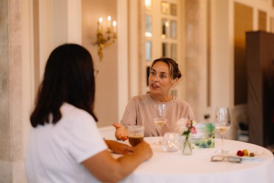 Guests seated at a table during dinner.