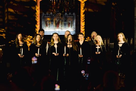 Choir performing inside a cathedral.