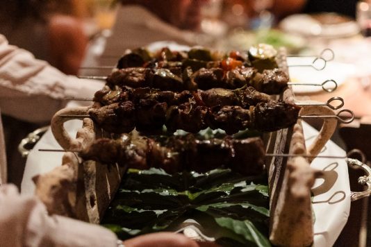 Grilled skewers on a serving platter