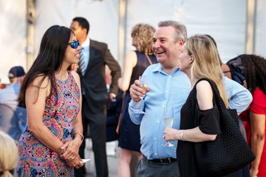 Guests mingling at cocktail reception