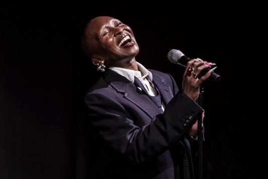 Cynthia Erivo singing on stage