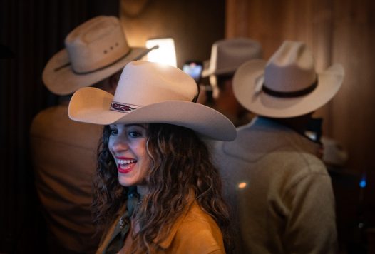 Guest wearing fitted cowboy hat