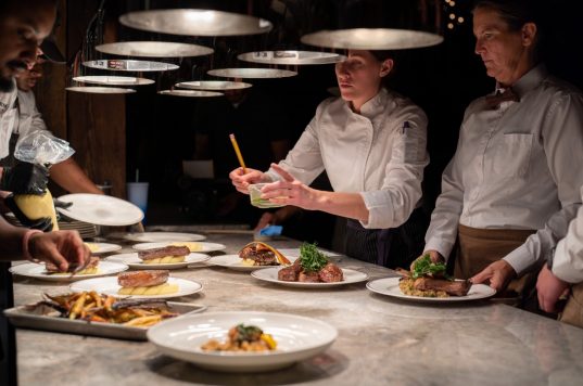 Ranch chefs plating dinner service