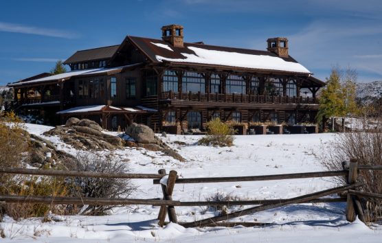 Snow-covered luxury ranch lodge
