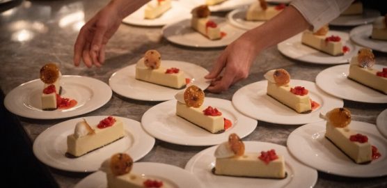 Gourmet desserts being plated