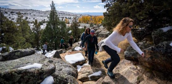 Guests hiking snowy trail
