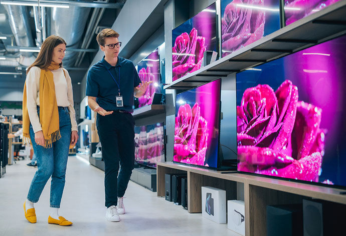 Newlyweds shop for a brand new, big screen TV